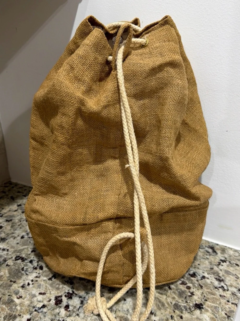 Tan Jute Drawstring Duffel Bag with Red Accent